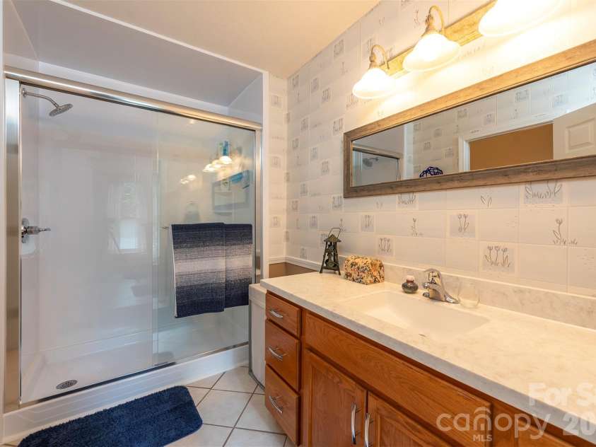 132 Rumbling Bald Road, Lake Lure, NC 28746.  MLS# CAR4385835, YatesRealty ID 26690. 