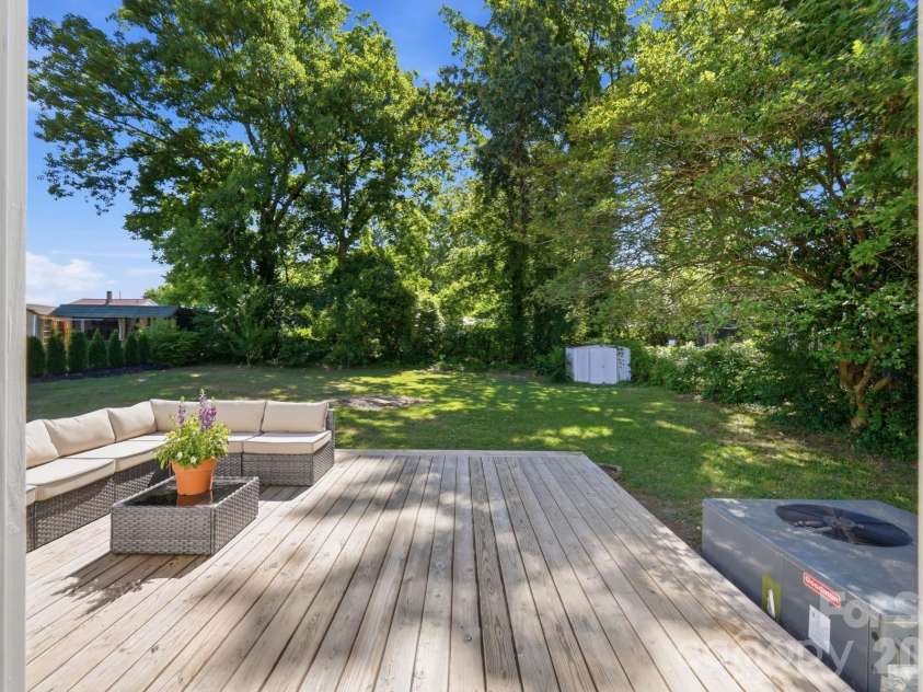 912 Laura Avenue, Kannapolis, NC 28083.  MLS# CAR4381175, YatesRealty ID 26691. Back deck off primary bedroom