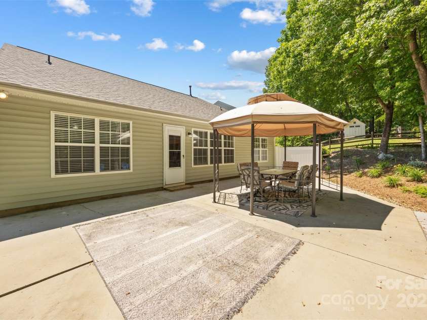 4323 Wiregrass Road, Indian Land, SC 29707.  MLS# CAR4235609, YatesRealty ID 26697. Back Patio