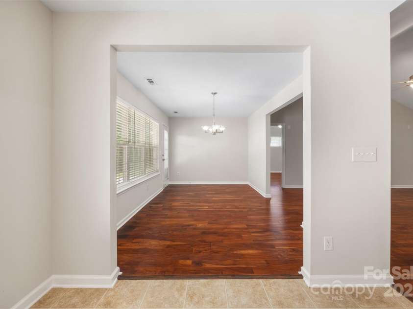 4323 Wiregrass Road, Indian Land, SC 29707.  MLS# CAR4235609, YatesRealty ID 26697. Breakfast looking into Dining room/Sunroom