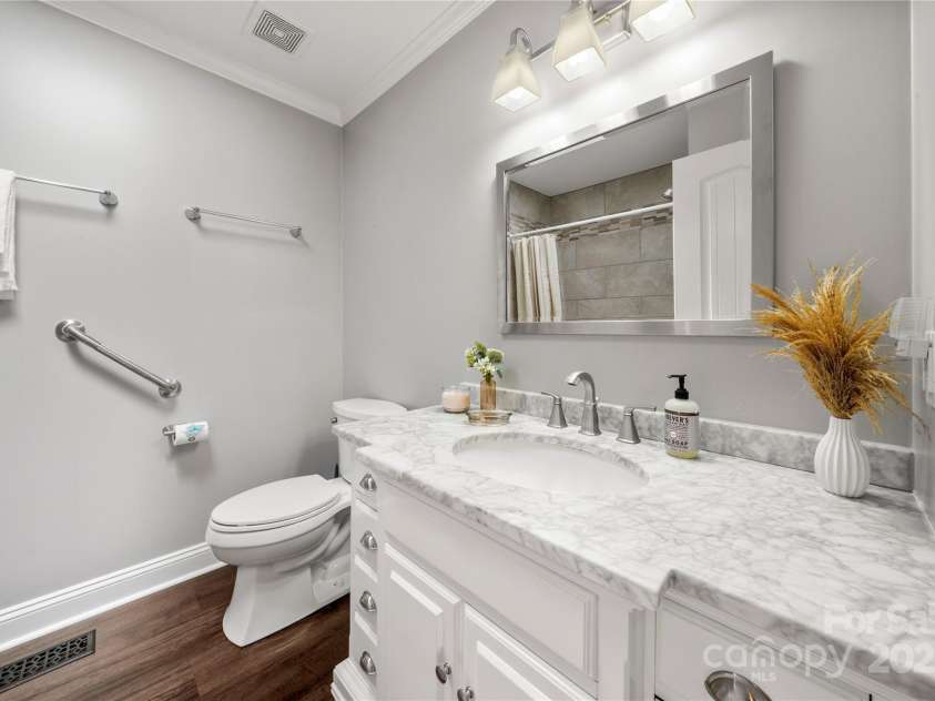 7 Turtle Lane, Clover, SC 29710.  MLS# CAR4257060, YatesRealty ID 26699. Second full bath updated with marble vanity and tile shower/tub