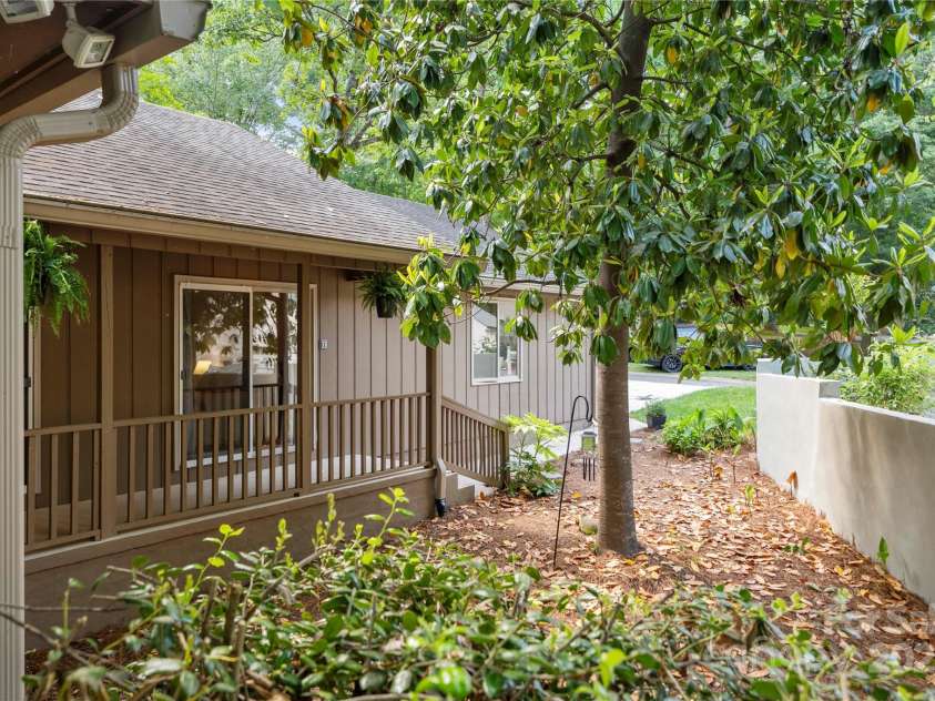 7 Turtle Lane, Clover, SC 29710.  MLS# CAR4257060, YatesRealty ID 26699. Side yard near entry