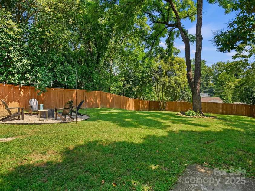 1516 Russell Avenue, Charlotte, NC 28216.  MLS# CAR4274064, YatesRealty ID 26704. Fenced in spacious yard
