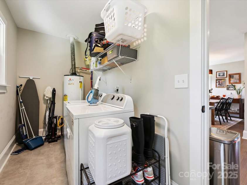 1516 Russell Avenue, Charlotte, NC 28216.  MLS# CAR4274064, YatesRealty ID 26704. Laundry room and storage off the kitchen