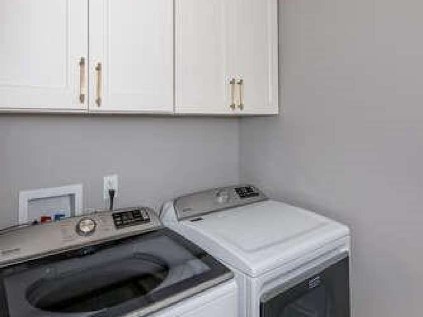207 Weybridge Drive, Arden, NC 28704.  MLS# CAR4276562, YatesRealty ID 26705. Laundry room