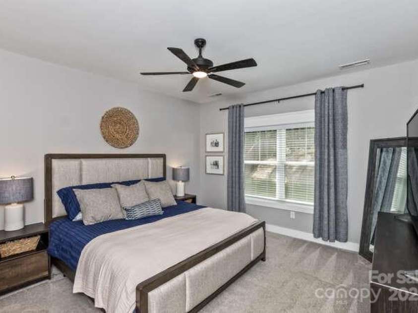 207 Weybridge Drive, Arden, NC 28704.  MLS# CAR4276562, YatesRealty ID 26705. Primary bedroom