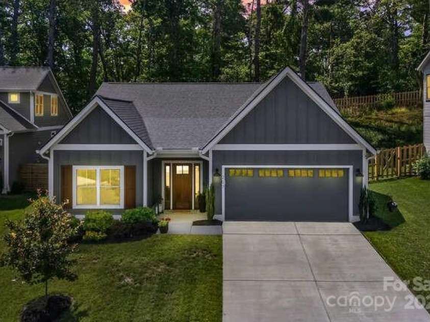 207 Weybridge Drive, Arden, NC 28704.  MLS# CAR4276562, YatesRealty ID 26705. Twilight