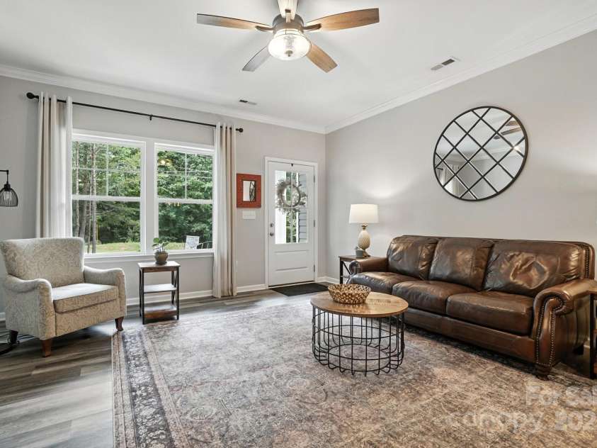 280 Mills Creek Road, Iron Station, NC 28080.  MLS# CAR4277070, YatesRealty ID 26706. Living Room as you walk into the front door.