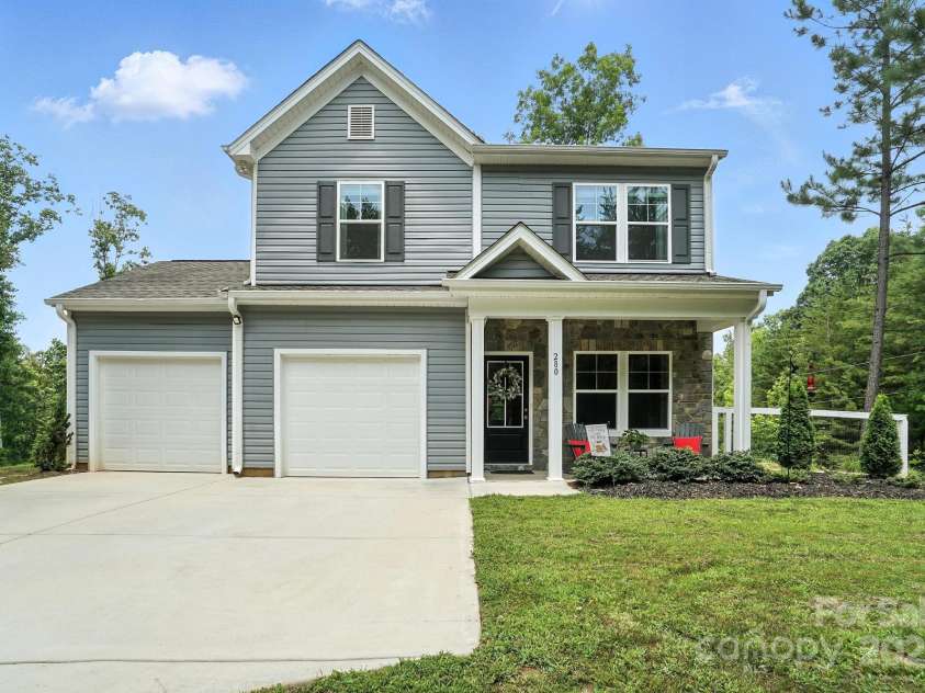 280 Mills Creek Road, Iron Station, NC 28080.  MLS# CAR4277070, YatesRealty ID 26706. Two car garage with split wall.  Open door access between the two sides.