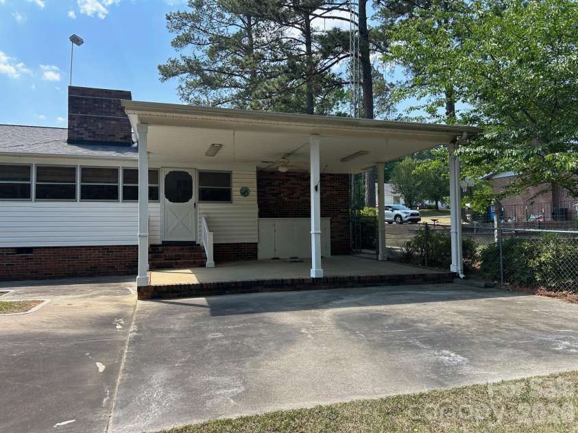 620 Mcdowell Drive, Chester, SC 29706.  MLS# CAR4374362, YatesRealty ID 26707. COVERED PATIO AREA IN BACK YARD