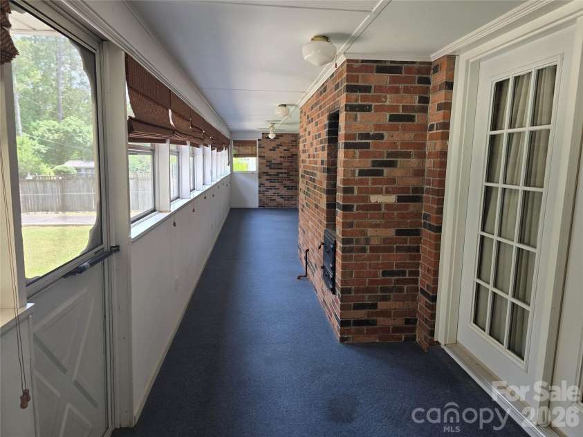 620 Mcdowell Drive, Chester, SC 29706.  MLS# CAR4374362, YatesRealty ID 26707. SUNROOM AREA IN BACK