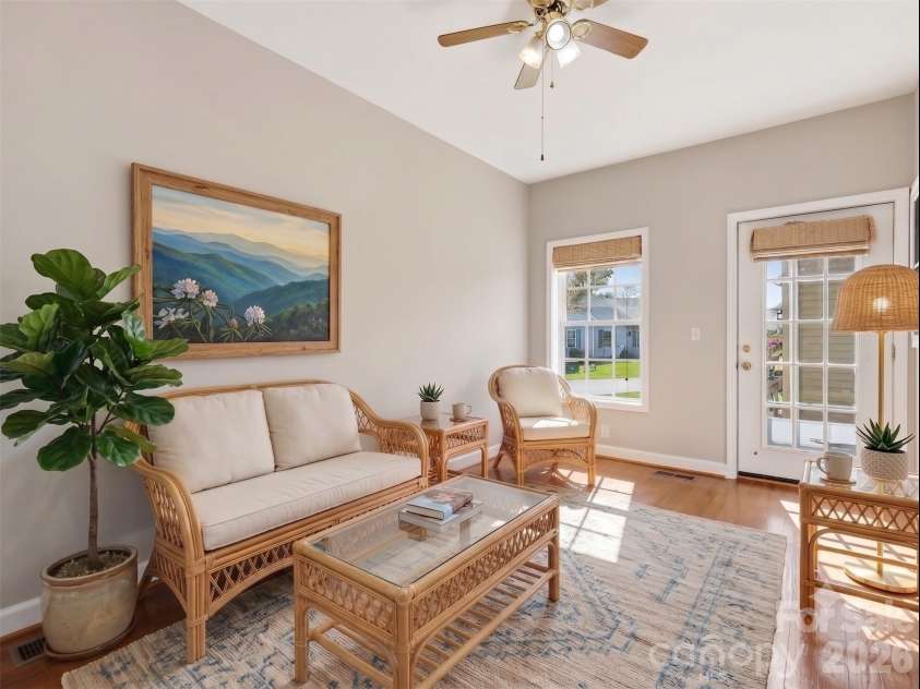 209 Beechnut Drive, Hendersonville, NC 28739.  MLS# CAR4379804, YatesRealty ID 26712. Virtually Staged as Sunroom