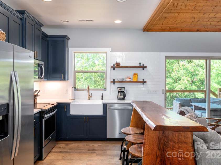 54 Weldon Way, Fairview, NC 28730.  MLS# CAR4279261, YatesRealty ID 26712. Convenient Kitchen to Living Access