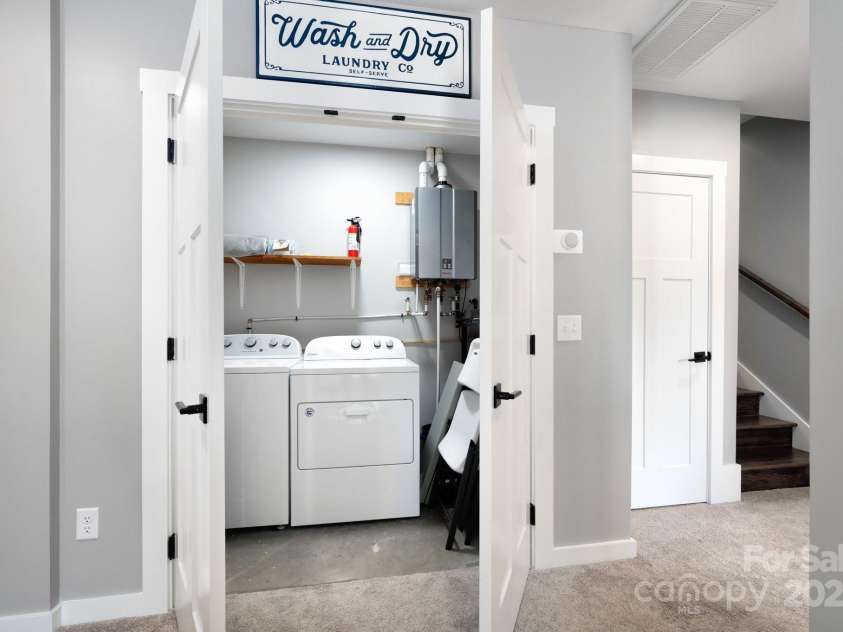 54 Weldon Way, Fairview, NC 28730.  MLS# CAR4279261, YatesRealty ID 26712. Convenient Laundry Room Access
