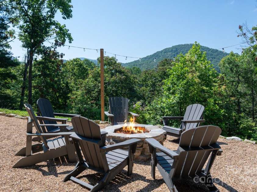 54 Weldon Way, Fairview, NC 28730.  MLS# CAR4279261, YatesRealty ID 26712. Enjoy the Views and Evenings by the Fire