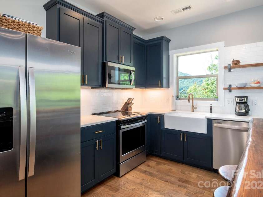 54 Weldon Way, Fairview, NC 28730.  MLS# CAR4279261, YatesRealty ID 26712. Low Maintenance and Sleek Kitchen Space