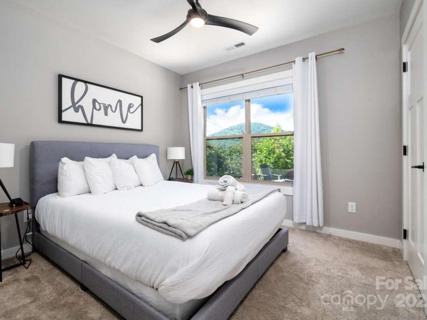 54 Weldon Way, Fairview, NC 28730.  MLS# CAR4279261, YatesRealty ID 26712. Lower Level Bedroom Two
