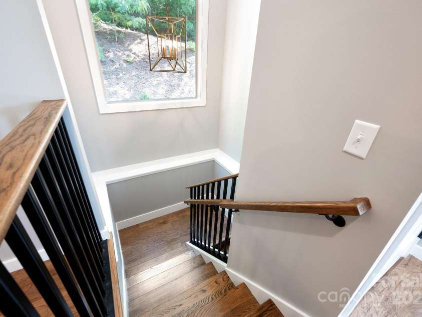 54 Weldon Way, Fairview, NC 28730.  MLS# CAR4279261, YatesRealty ID 26712. Stairwell to Lower Level