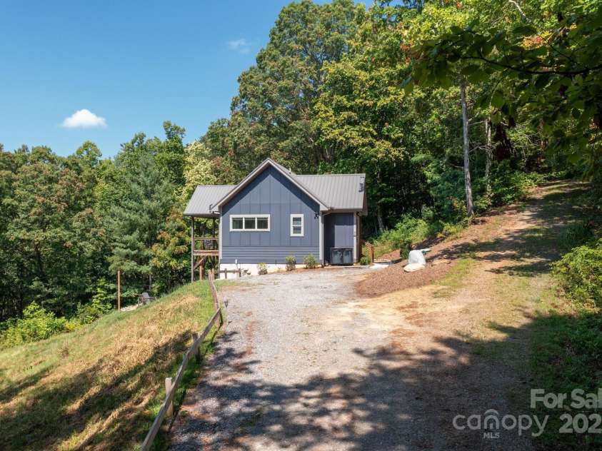 54 Weldon Way, Fairview, NC 28730.  MLS# CAR4279261, YatesRealty ID 26712. Well-maintained landscaping