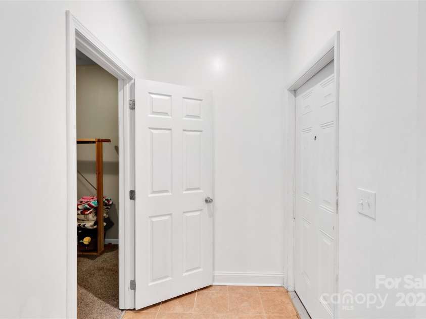 111 Crowell Drive, Concord, NC 28025.  MLS# CAR4281441, YatesRealty ID 26715. Rear Unit Hallway