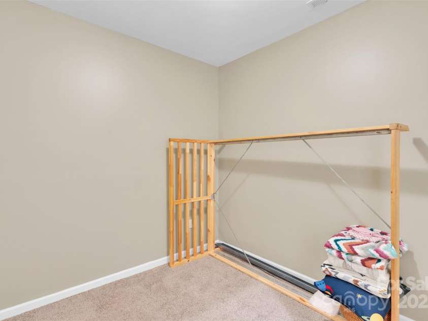 111 Crowell Drive, Concord, NC 28025.  MLS# CAR4281441, YatesRealty ID 26715. Rear Unit Room 1