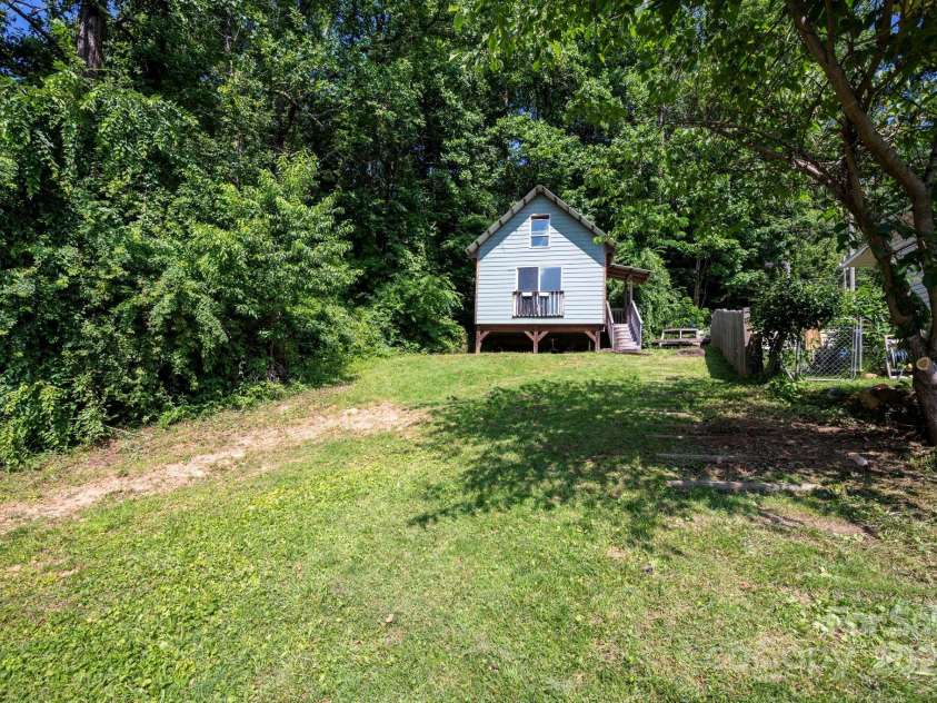109 Azalea Avenue, Swannanoa, NC 28778.  MLS# CAR4276188, YatesRealty ID 26716. Plenty of Space to Garden