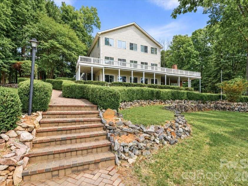 113 Tinker Place, Troutman, NC 28166.  MLS# CAR4384005, YatesRealty ID 26717. Back of home