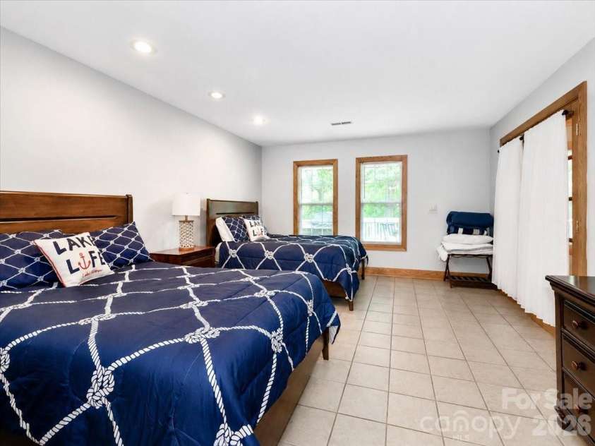 113 Tinker Place, Troutman, NC 28166.  MLS# CAR4384005, YatesRealty ID 26717. Den/bedroom main level