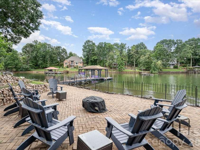 113 Tinker Place, Troutman, NC 28166.  MLS# CAR4384005, YatesRealty ID 26717. Firepit area
