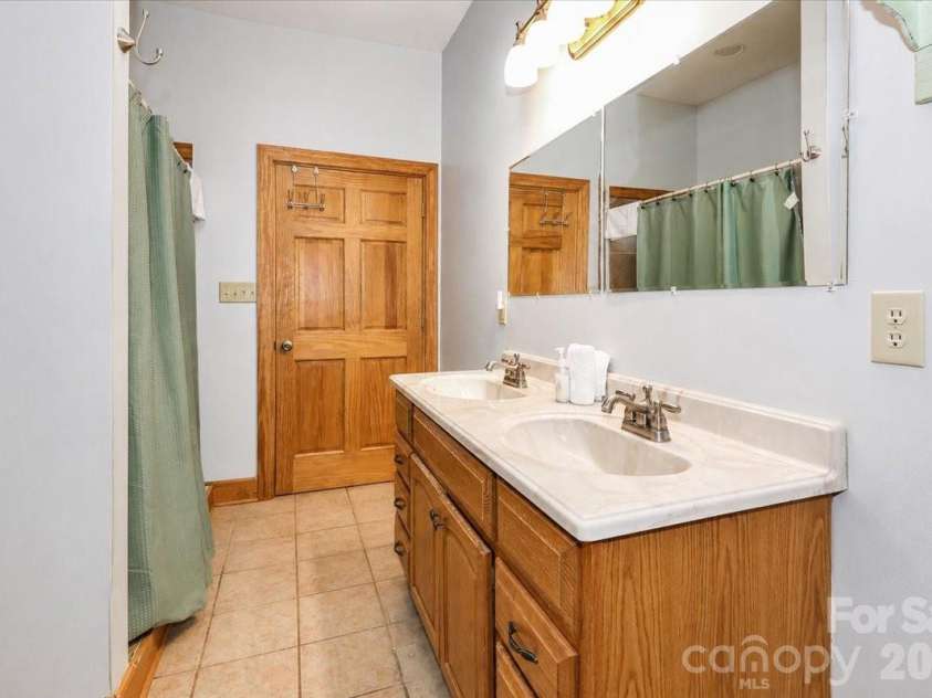 113 Tinker Place, Troutman, NC 28166.  MLS# CAR4384005, YatesRealty ID 26717. Full bath basement