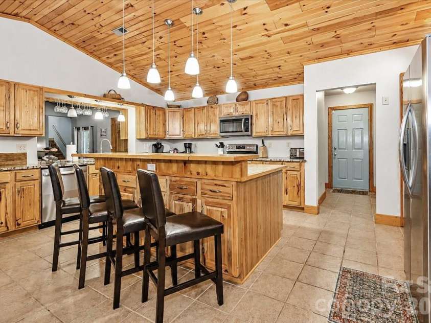 113 Tinker Place, Troutman, NC 28166.  MLS# CAR4384005, YatesRealty ID 26717. Kitchen main level