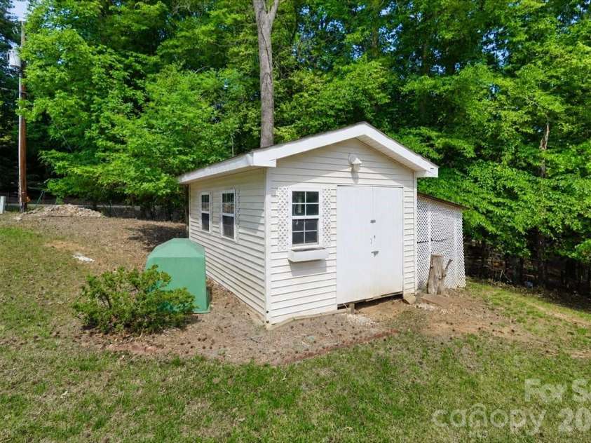 113 Tinker Place, Troutman, NC 28166.  MLS# CAR4384005, YatesRealty ID 26717. Shed