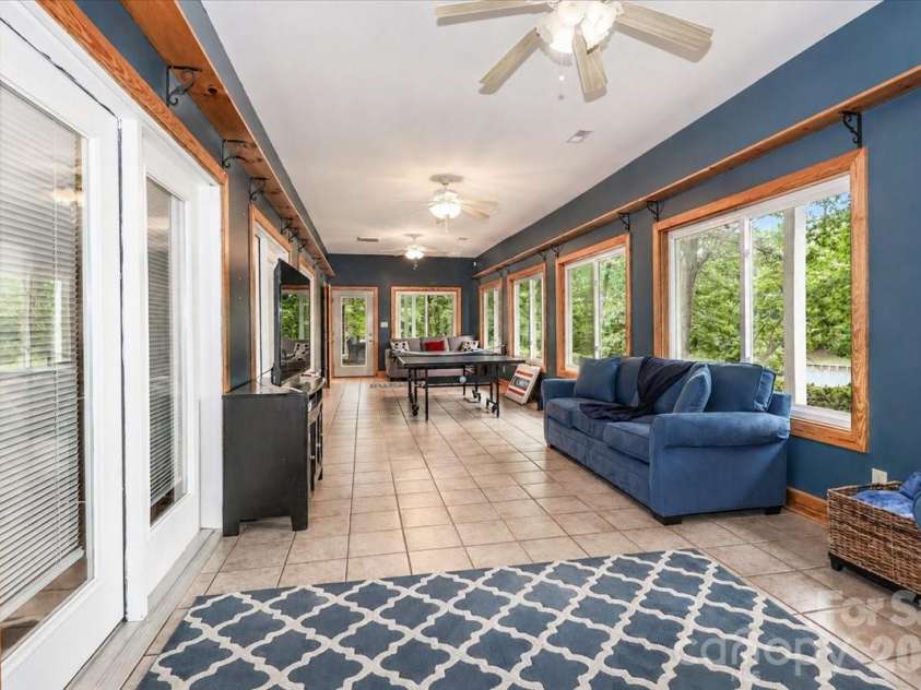 113 Tinker Place, Troutman, NC 28166.  MLS# CAR4384005, YatesRealty ID 26717. Sunroom basement