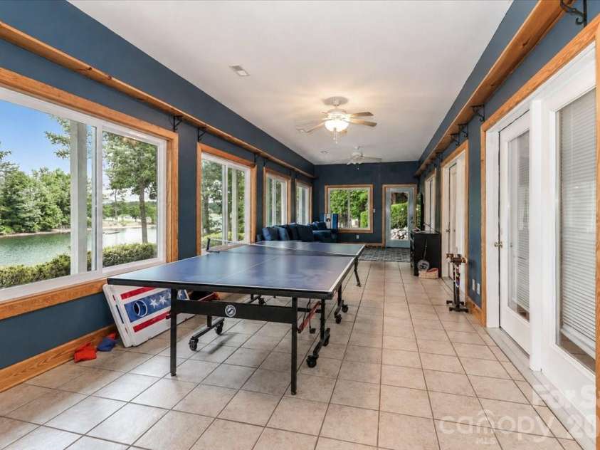 113 Tinker Place, Troutman, NC 28166.  MLS# CAR4384005, YatesRealty ID 26717. Sunroom basement
