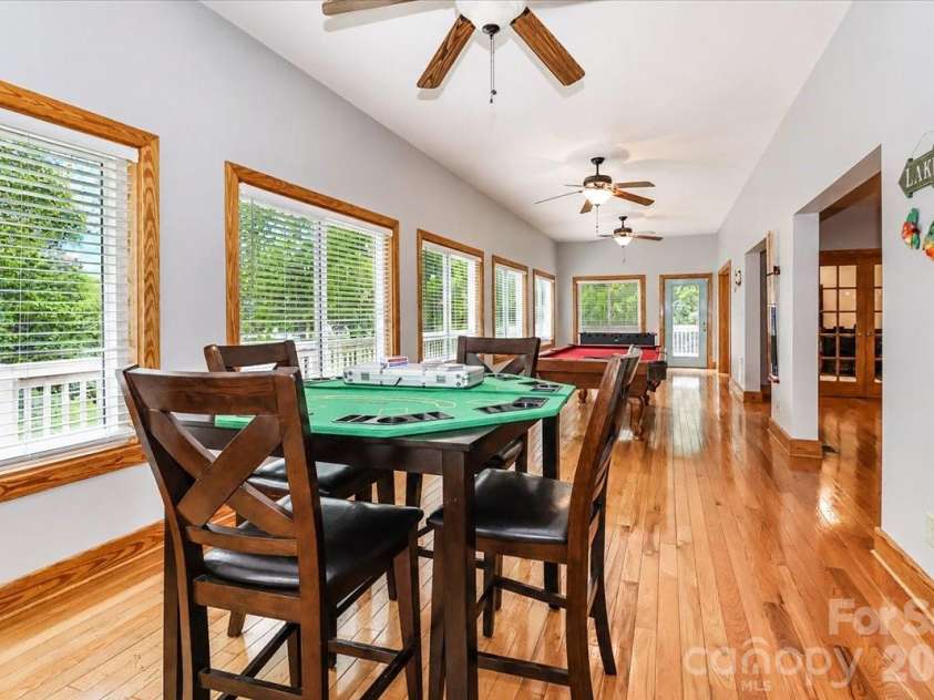 113 Tinker Place, Troutman, NC 28166.  MLS# CAR4384005, YatesRealty ID 26717. Sunroom/game room main level
