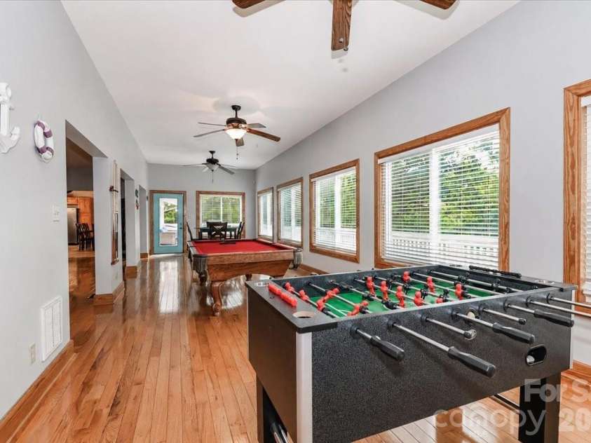 113 Tinker Place, Troutman, NC 28166.  MLS# CAR4384005, YatesRealty ID 26717. Sunroom/game room main level