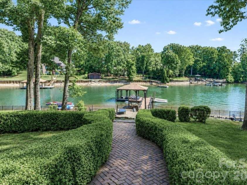 113 Tinker Place, Troutman, NC 28166.  MLS# CAR4384005, YatesRealty ID 26717. Walkway to dock