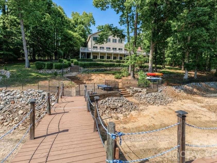 113 Tinker Place, Troutman, NC 28166.  MLS# CAR4384005, YatesRealty ID 26717. Walkway up to the home