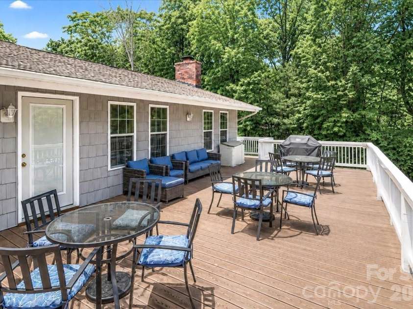 113 Tinker Place, Troutman, NC 28166.  MLS# CAR4384005, YatesRealty ID 26717. Wrap around deck main level