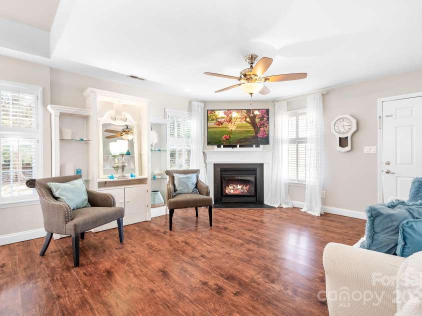 449 Doves Crest Court, Stanley, NC 28164.  MLS# CAR4220525, YatesRealty ID 2672. Great Room with Gas Fireplace