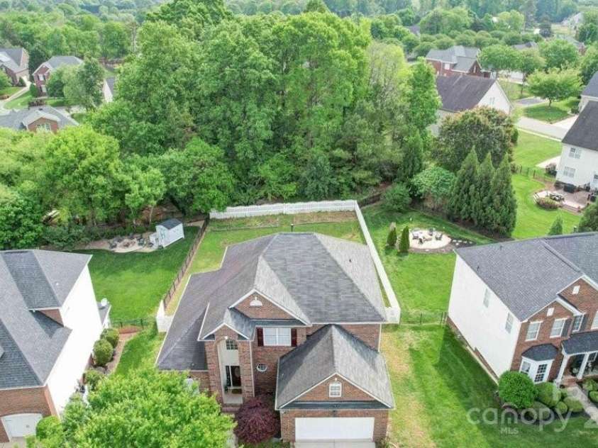 7642 Horseshoe Creek Drive, Huntersville, NC 28078.  MLS# CAR4249944, YatesRealty ID 26720. Arial view of Home.  Notice the fenced in backyard with gate.