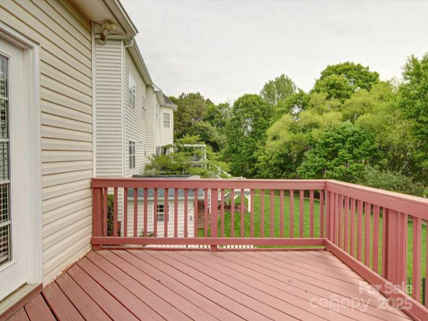 7642 Horseshoe Creek Drive, Huntersville, NC 28078.  MLS# CAR4249944, YatesRealty ID 26720. Spacious back deck