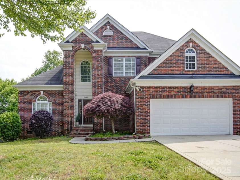 7642 Horseshoe Creek Drive, Huntersville, NC 28078.  MLS# CAR4249944, YatesRealty ID 26720. Welcome Home! A front view featuring a Japanese maple warmly welcomes you.