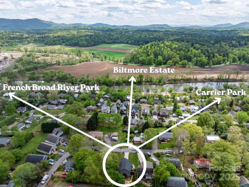 45 Tahkieostie Trail, Asheville, NC 28806.  MLS# CAR4250758, YatesRealty ID 26721. Just up the hill from French Broad River Park and Carrier Park, and views overlooking the Biltmore Estate.