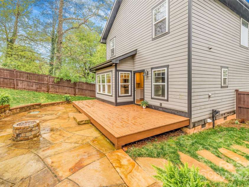 45 Tahkieostie Trail, Asheville, NC 28806.  MLS# CAR4250758, YatesRealty ID 26721. Large porch off back of house.