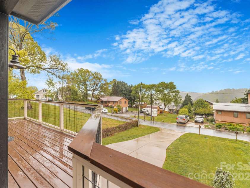 45 Tahkieostie Trail, Asheville, NC 28806.  MLS# CAR4250758, YatesRealty ID 26721. Wrap around front porch with great view.