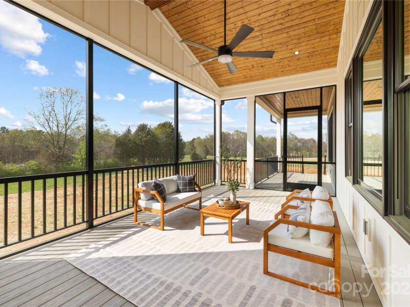 111 Monbo Meadows Lane, Statesville, NC 28677.  MLS# CAR4318689, YatesRealty ID 26730. Screened Back Porch 