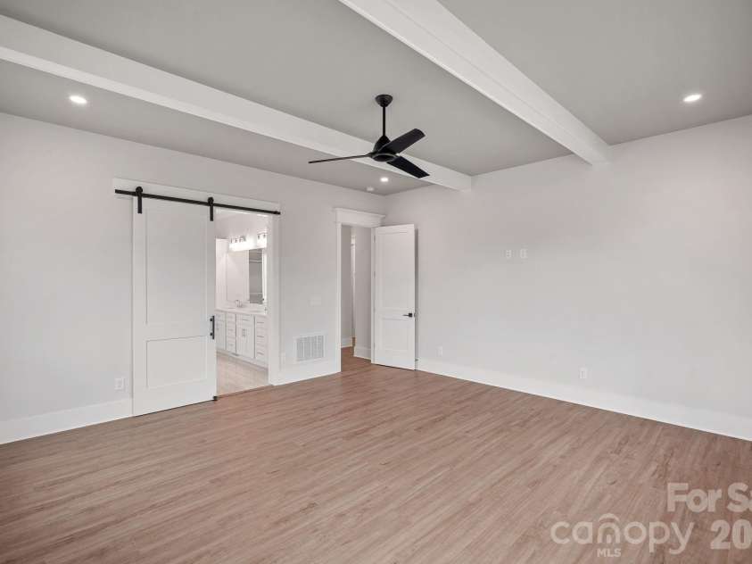 111 Monbo Meadows Lane, Statesville, NC 28677.  MLS# CAR4336887, YatesRealty ID 26730. Don't you just love a barn door?