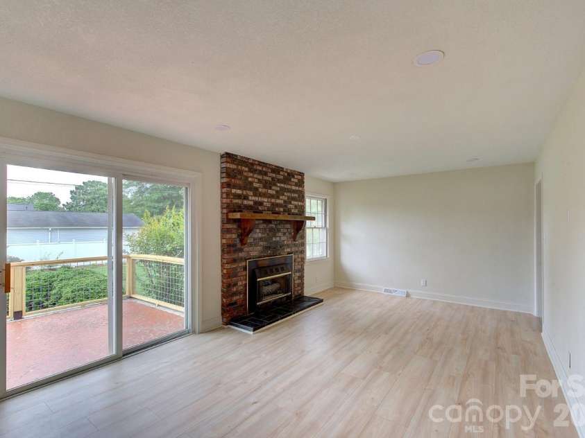 1195 Holly Springs Road, Lyman, SC 29365.  MLS# CAR4387941, YatesRealty ID 26730. Den off kitchen