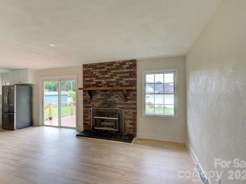 1195 Holly Springs Road, Lyman, SC 29365.  MLS# CAR4387941, YatesRealty ID 26730. Den off kitchen